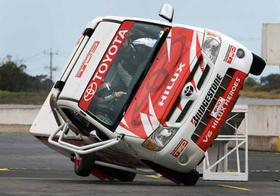 timo glock driving with toyota hilux stunt